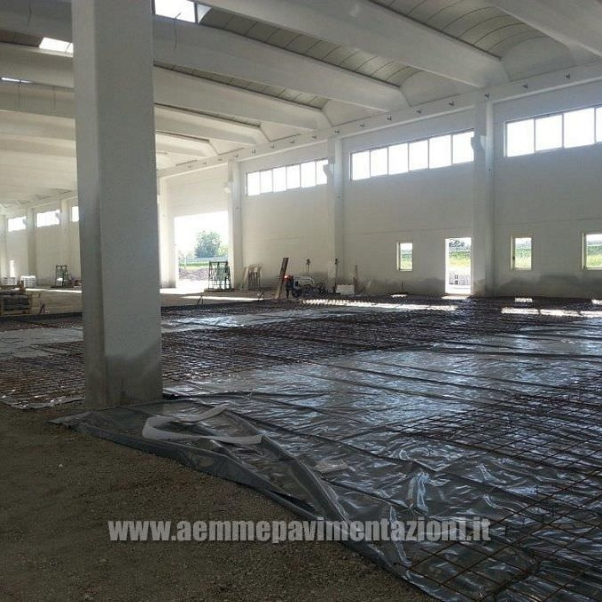 Pavimentazione in calcestruzzo con armatura mista